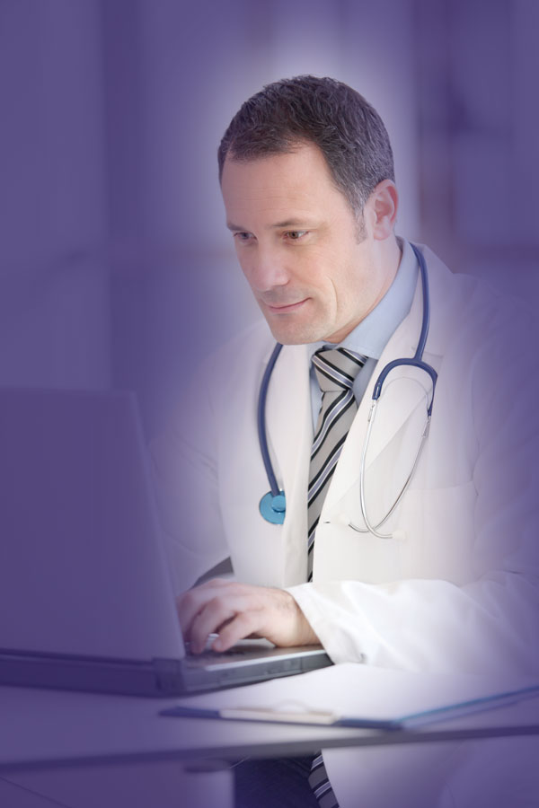 male-doctor-on-computer.